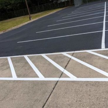 -parking lot maintenance, sealcoating, asphalt repair-
