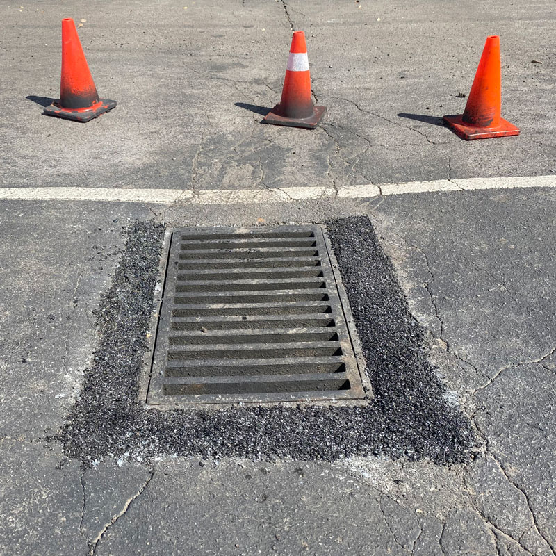 parking lot drain repair patch