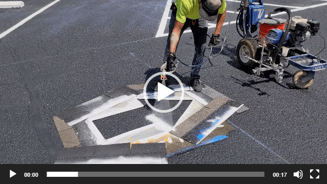 spraying-directional-arrow spraying a directional parking lot arrow