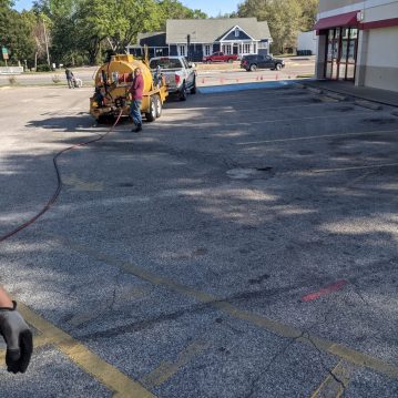 -parking lot maintenance, sealcoating, asphalt repair-