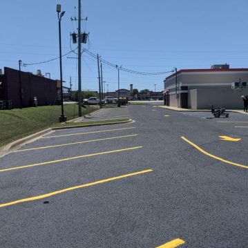 parking lot maintenance, sealcoating, resurfacing, striping