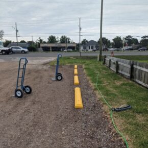 parking lot maintenance gravel dirt lot with parking blocks
