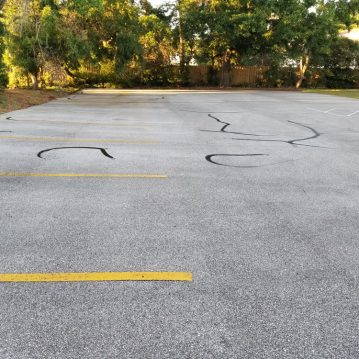 pensacola parking lot sealcoating striping crack seal example